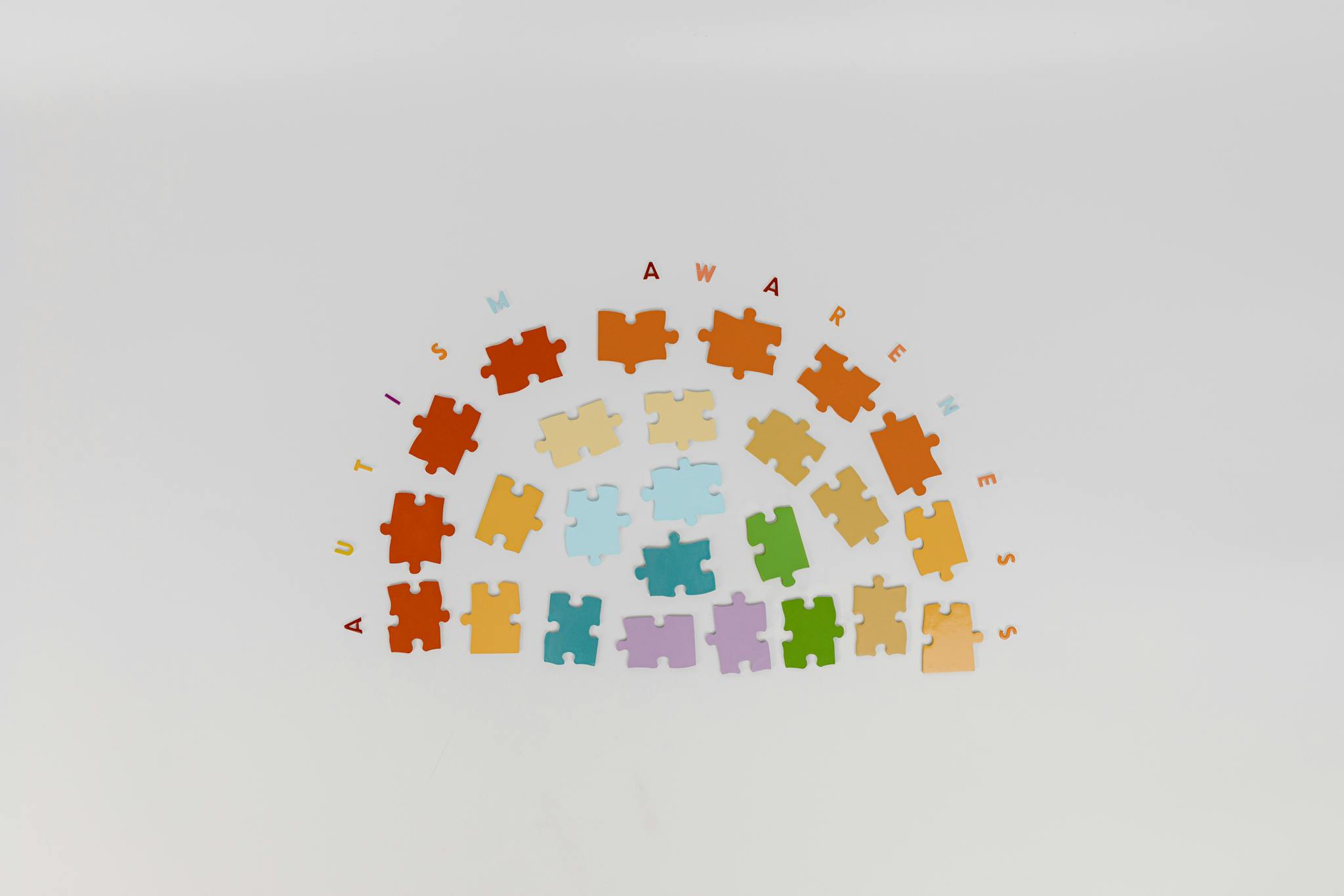 Colorful puzzle pieces arranged to promote autism awareness